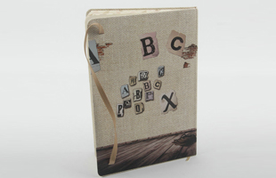 M-A5 Alphabet Wheel Print Cover with Leather Strap Closure Notebook